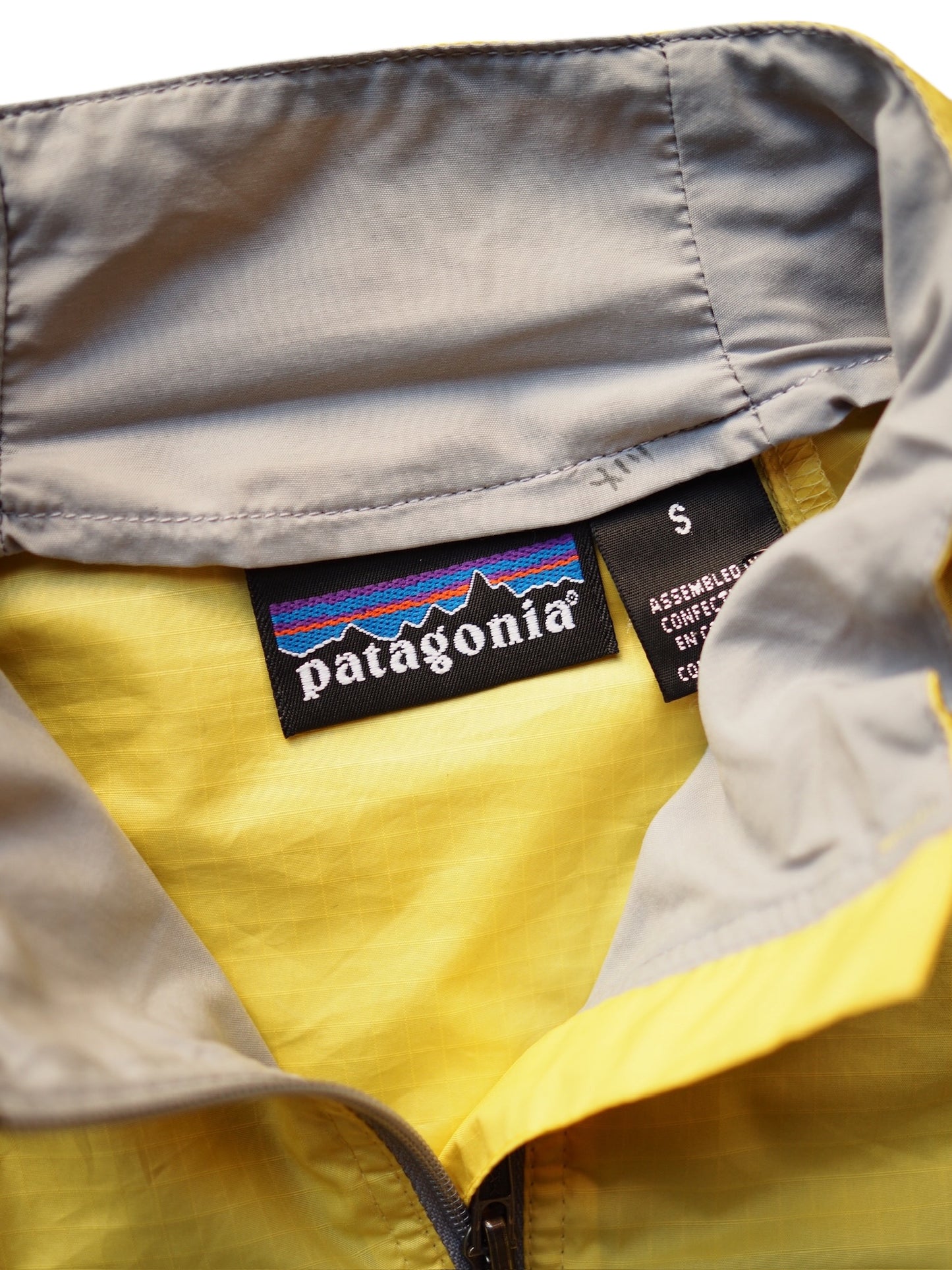Patagonia / 01's M's Velocity O2 (canary)